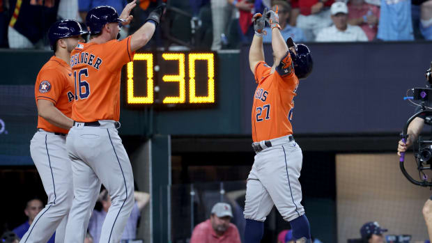 Oct 20, 2023; Arlington, Texas, USA; Houston Astros second baseman Jose Altuve (27) celebrates with shortstop Grae Kessinger (16) after hitting a three-run home run during the ninth inning of game five in the ALCS against the Texas Rangers for the 2023 MLB playoffs at Globe Life Field. Mandatory Credit: Kevin Jairaj-USA TODAY Sports